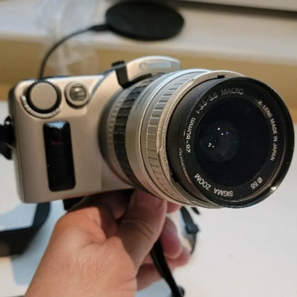 Canon EOS IX Camera With Aspherical Lens Case and tripod